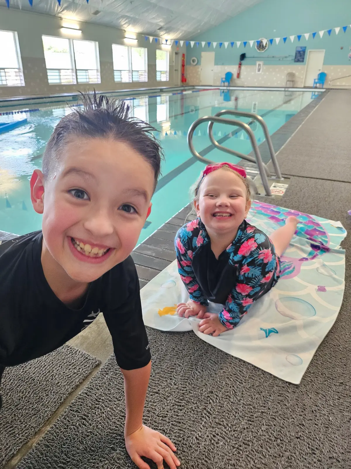 Kids poolside after swim lesson